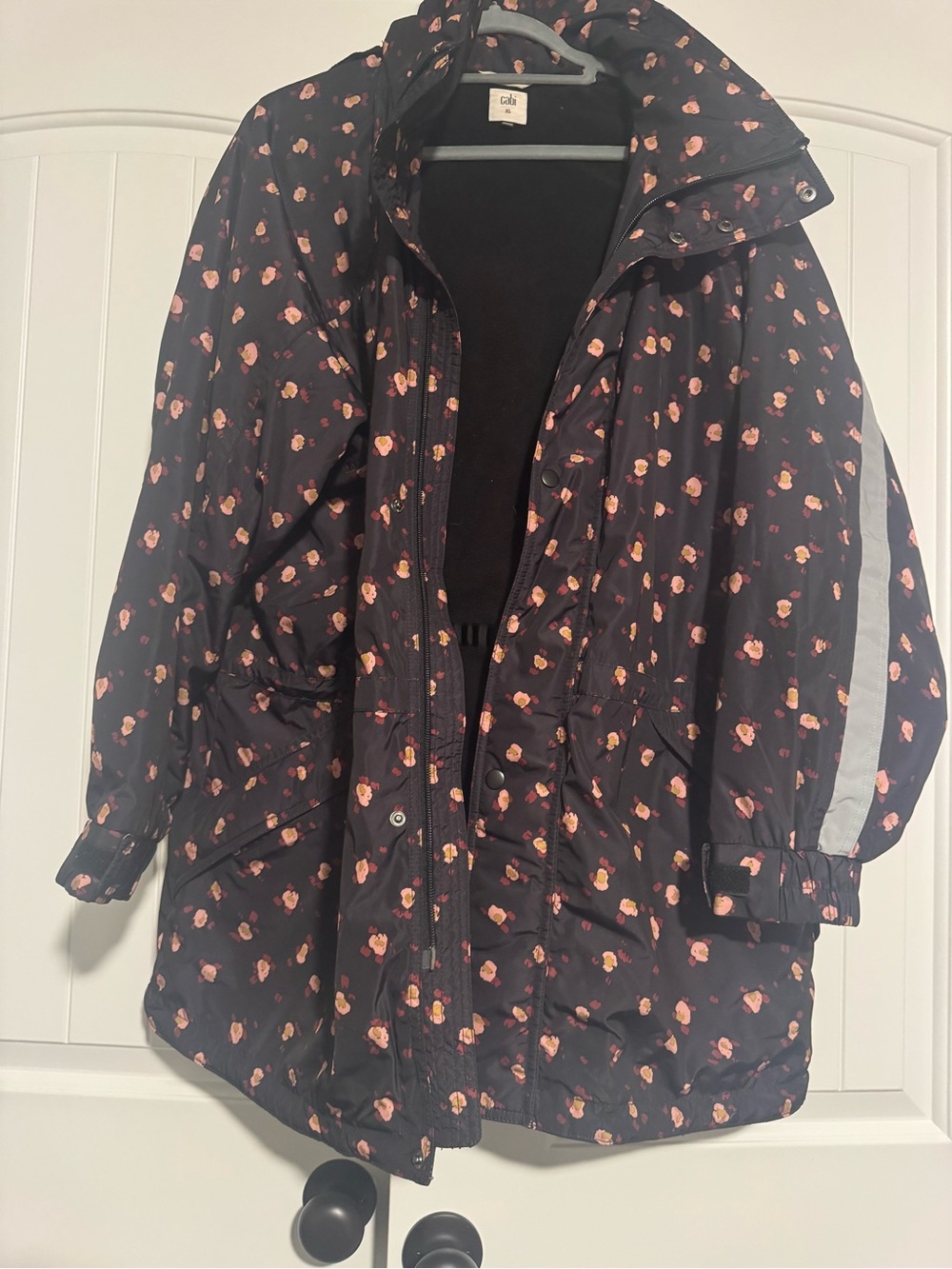 CAbi black floral reflective raincoat